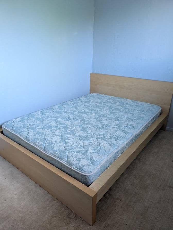 Ikea pine light wood full bed frame with slats and Sealy Posturepedic firm double mattress