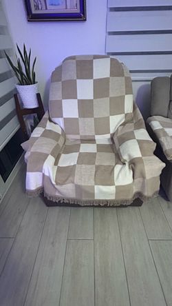 Sofá reclinable y masajeador