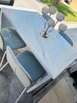 White Marble Table and 4 Gray Chairs