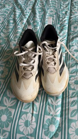 Baseball cleats.