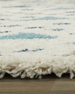 Uhrichsville Geometric Ivory/Blue Area Rug

