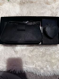 Hermosa cartera marca Aldo