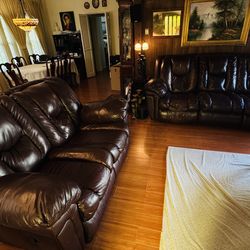 Leather Sofa and love seat including 4 recliners.