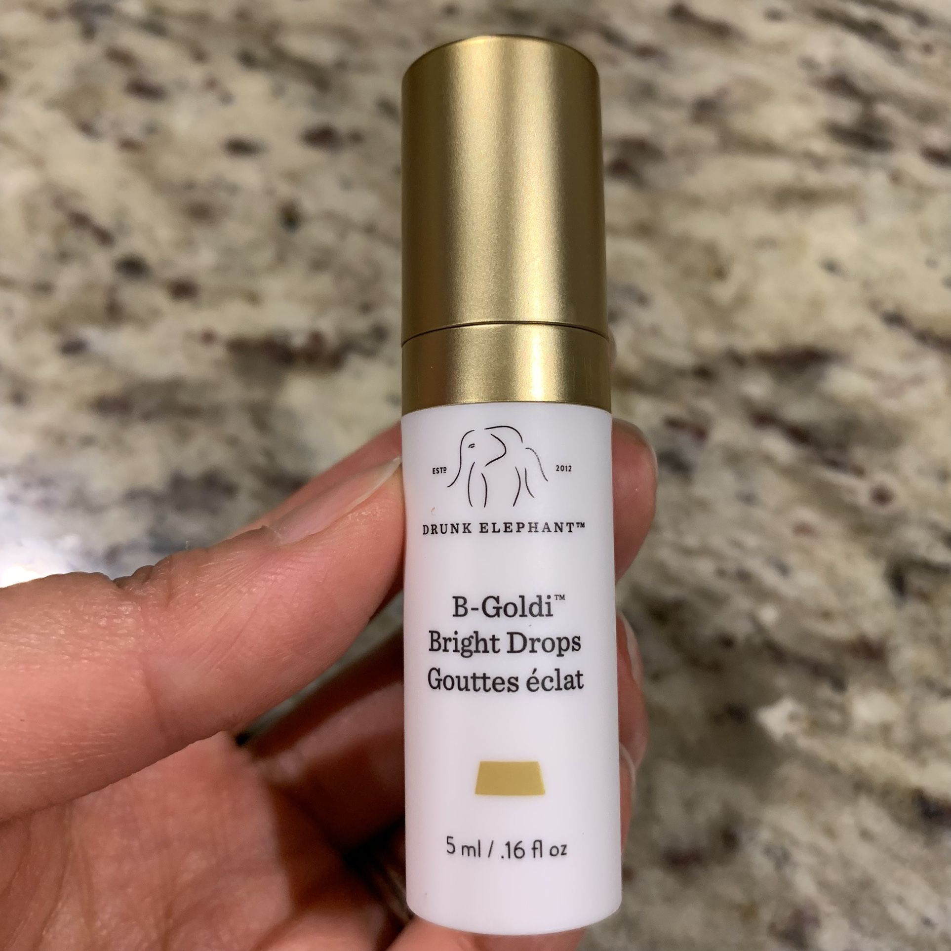 Drunk Elephant B-Goldi Bright Drops Highlighter 5mL Travel Size.