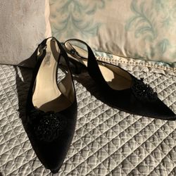 Prada black beaded  slip-on heels.