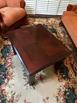 Wood end table with wave square design pattern and cherry mahogany finish