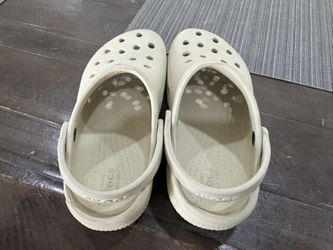 Crocs  Tan And black.  Child 13 Size 
