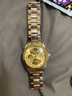stainless steel automatic watch with a solid, heavy feel