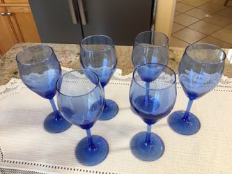 6 piece Blue wine glasses. Never been used.