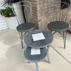 Pier 1 outdoor metal bistro patio set. 2 chairs and 2 nesting tables. Great condition. Very sturdy and high quality metal. I believe it’s powder coate