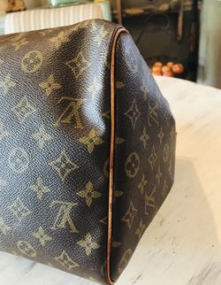 Authentic Louis Vuitton Keepall 45 Travel Bag with luggage tag for