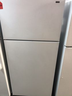 Used Hotpoint top and bottom fridge. 1 year warranty