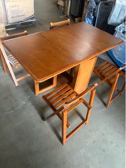 Walnut-colored solid wood folding table and chair set (includes 4 chairs)