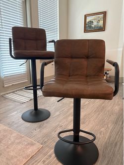 Faux leather swivel bar stools