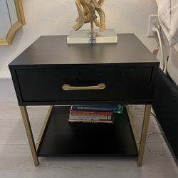Black and matte gold side table