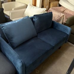 Brand new small couches blue velvet  55” x29” our price $150 we will consider a fear offer 