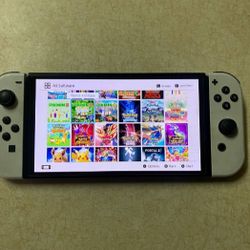 Nintendo Switch OLED With 100 Switch Games