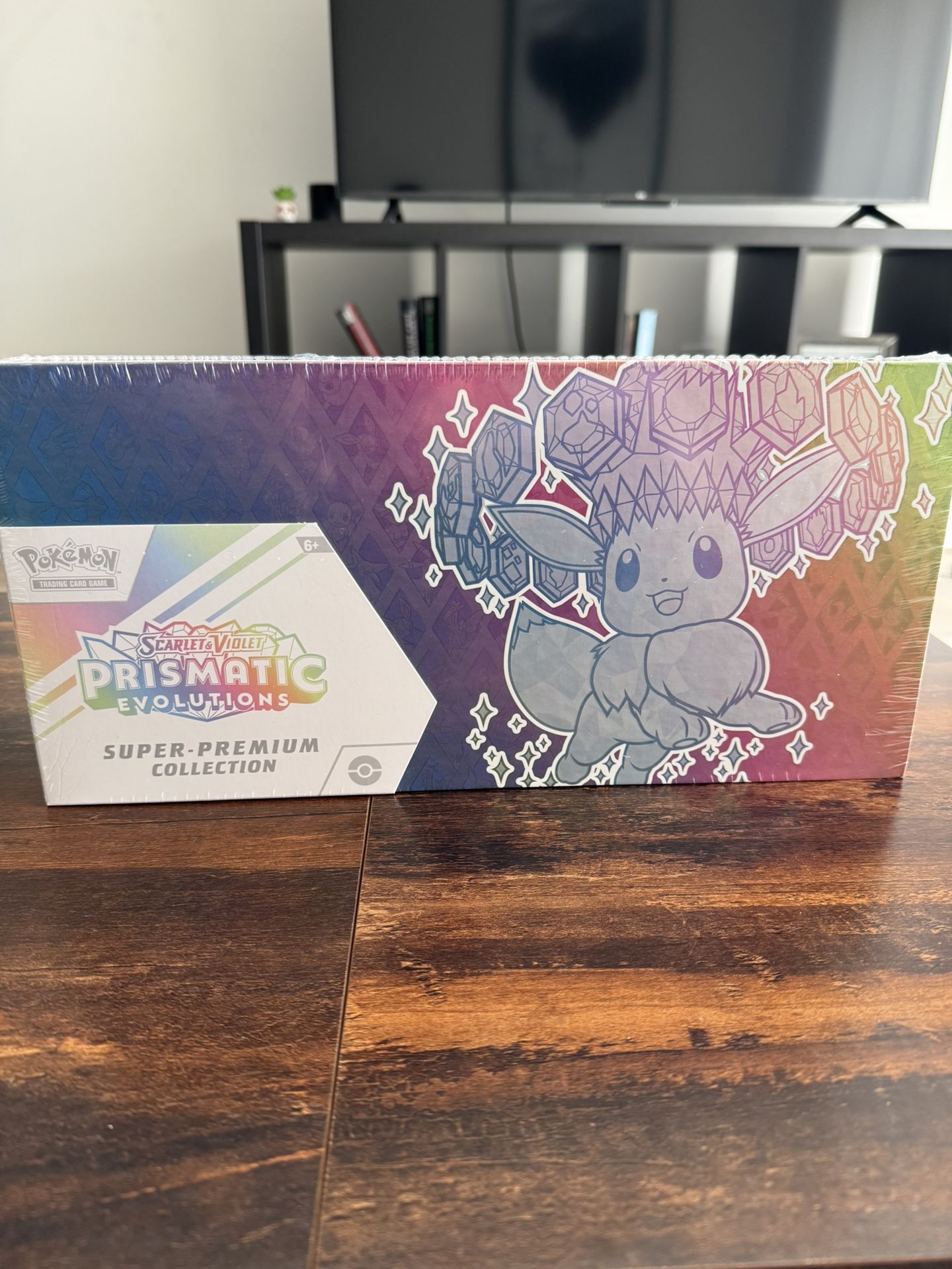 Prismatic Evolutions SPC (Tiny Tear On Top Of Seal)