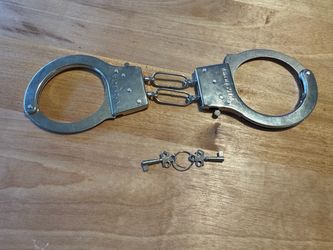 Metal handcuffs with keys