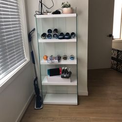 Modern high gloss white glass bookcase
