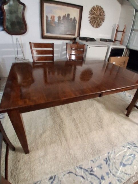 Nice Extendable Dining With Four Chairs