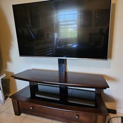 55 inch LG 4k TV with entertainment center mounted