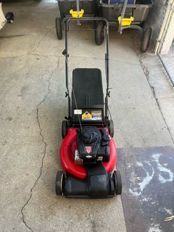 Yard Machines 21-inch self propelled gas lawn mower powered by a Briggs & Stratton engine