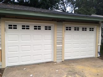 New garage door 8 x 7 with windows $ 750.00