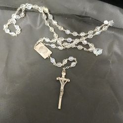 Catholic rosary made with clear faceted crystal beads and sterling silver findings