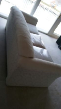 Couch.love seat. 4 pillows. 2 chairs...white.