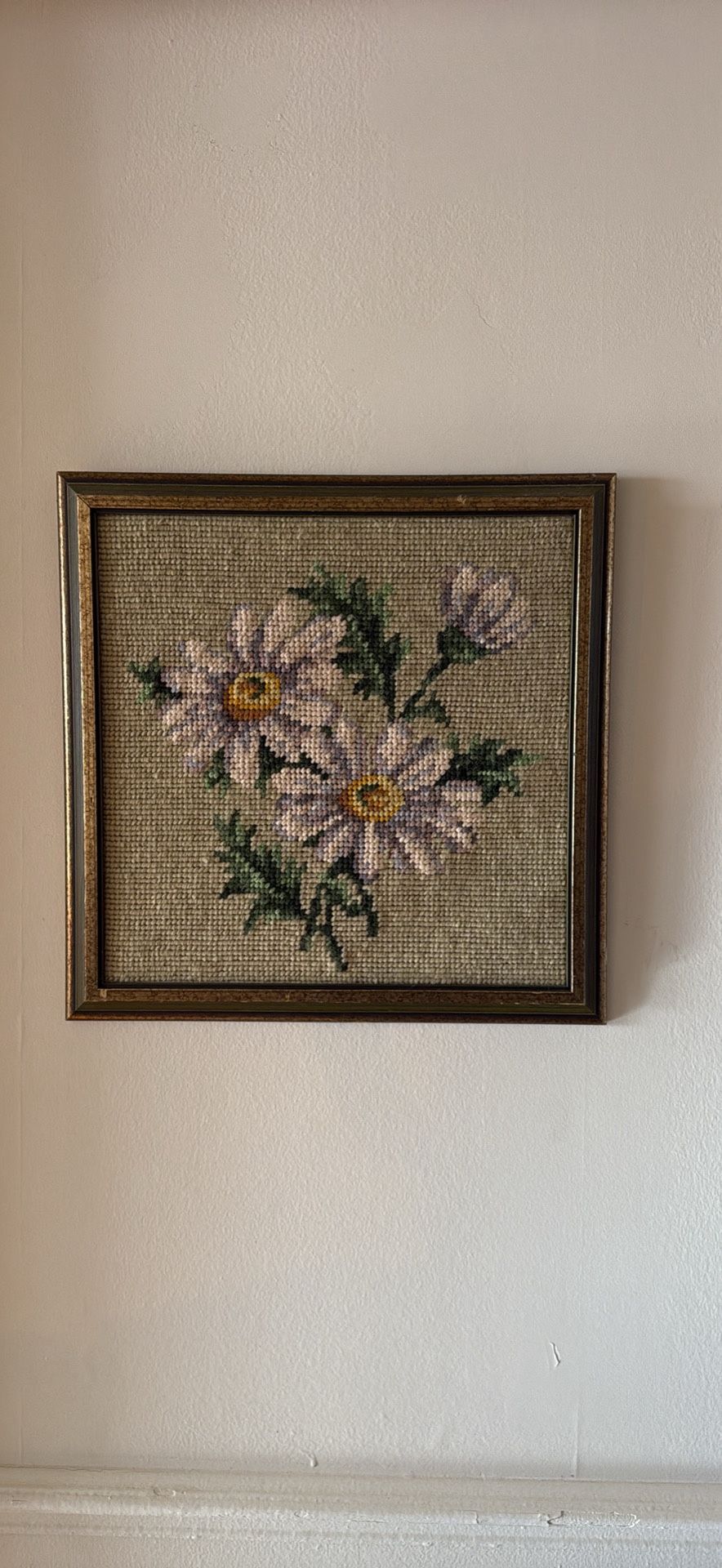 Woven ( crochet?) floral framed art.