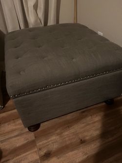 Grey storage ottoman