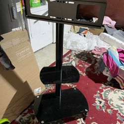 Tv Stand        And Refrigerator 