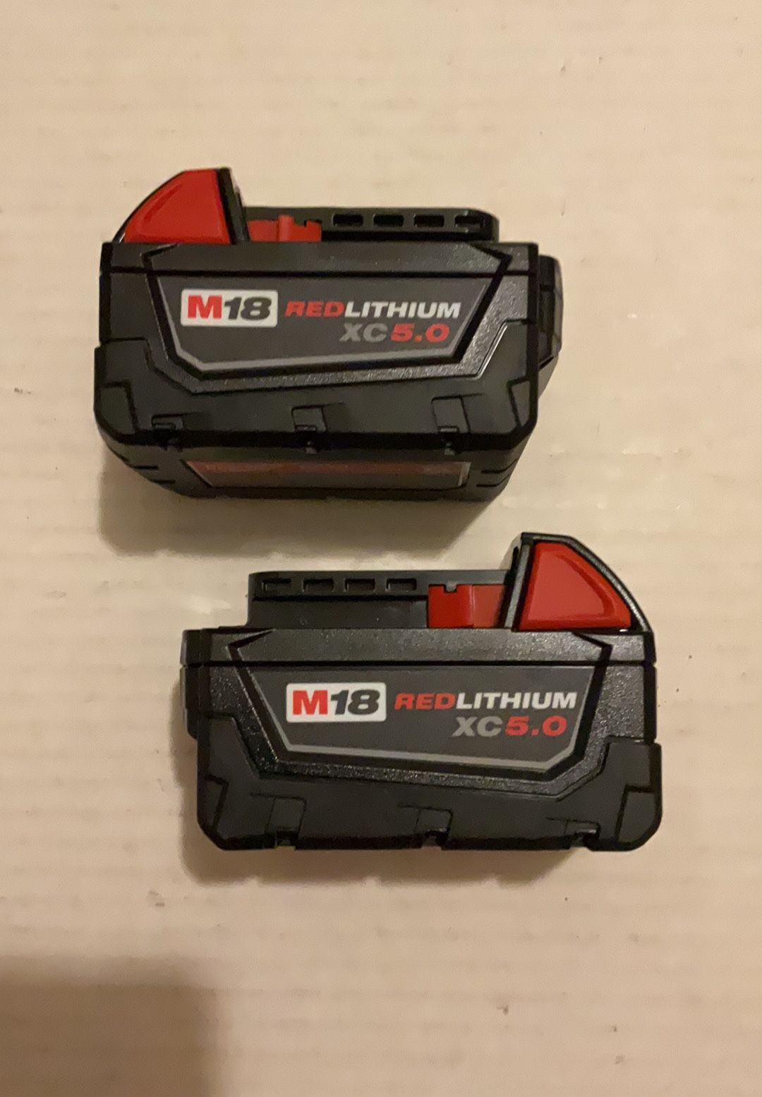 Brand new milwaukee m18 red lithium xc 5 0 batteries 120 firm on price