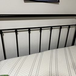 Brown metal Queen bed frame