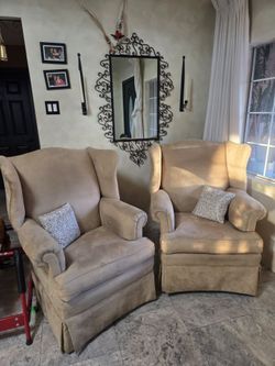 2 wing back arm chairs