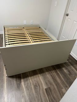 IKEA GURSKEN full-size bed frame with headboard