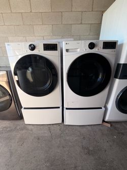 LG ThinQ Front-Load Washer and Dryer Set With Pedestals