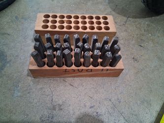 Vintage 1/2 inch steal stampers 27 pieces.