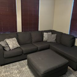 Living Spaces Sectional With Ottoman