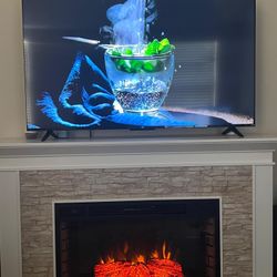 Flat Screen TV And Electric Fire Place