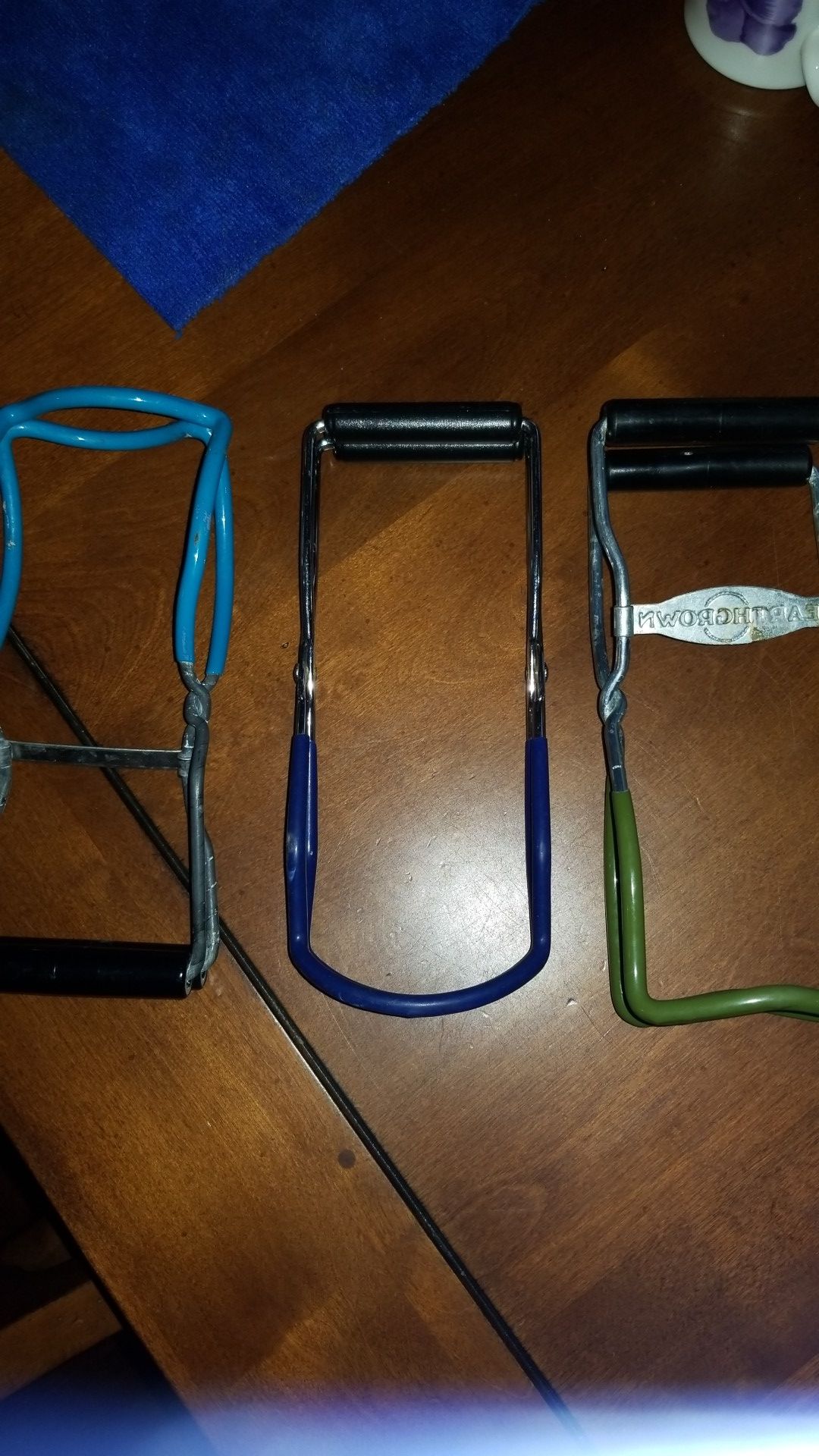 Three canning jar bottle holders