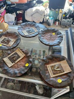 rustic iron or metal plate or charger by designer Jan Barboglio 23 pieces