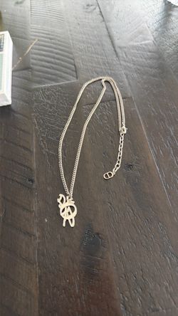Travis Scott Dior necklace
