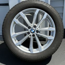 Four Bridgestone Snow Tires With BMW Rims