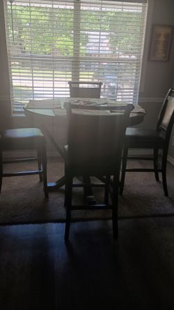 Dining room for sale with chairs.