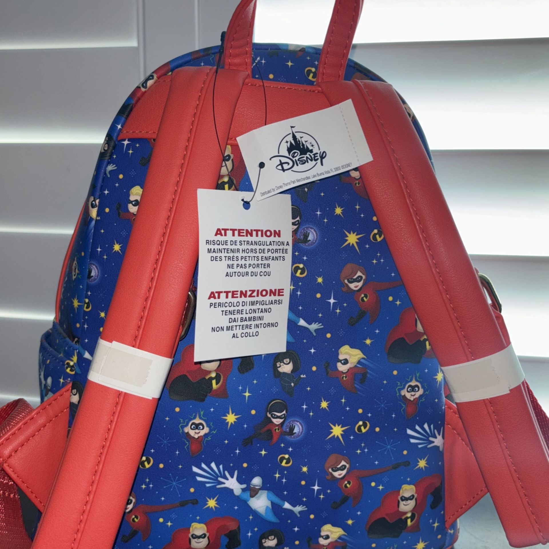 incredibles mini backpack Loungefly The 20th Anniversary Light Up Metallic Cosplay with Coin Bag Interior lining matching theme Loungefly The Incredibles Syndrome Glow