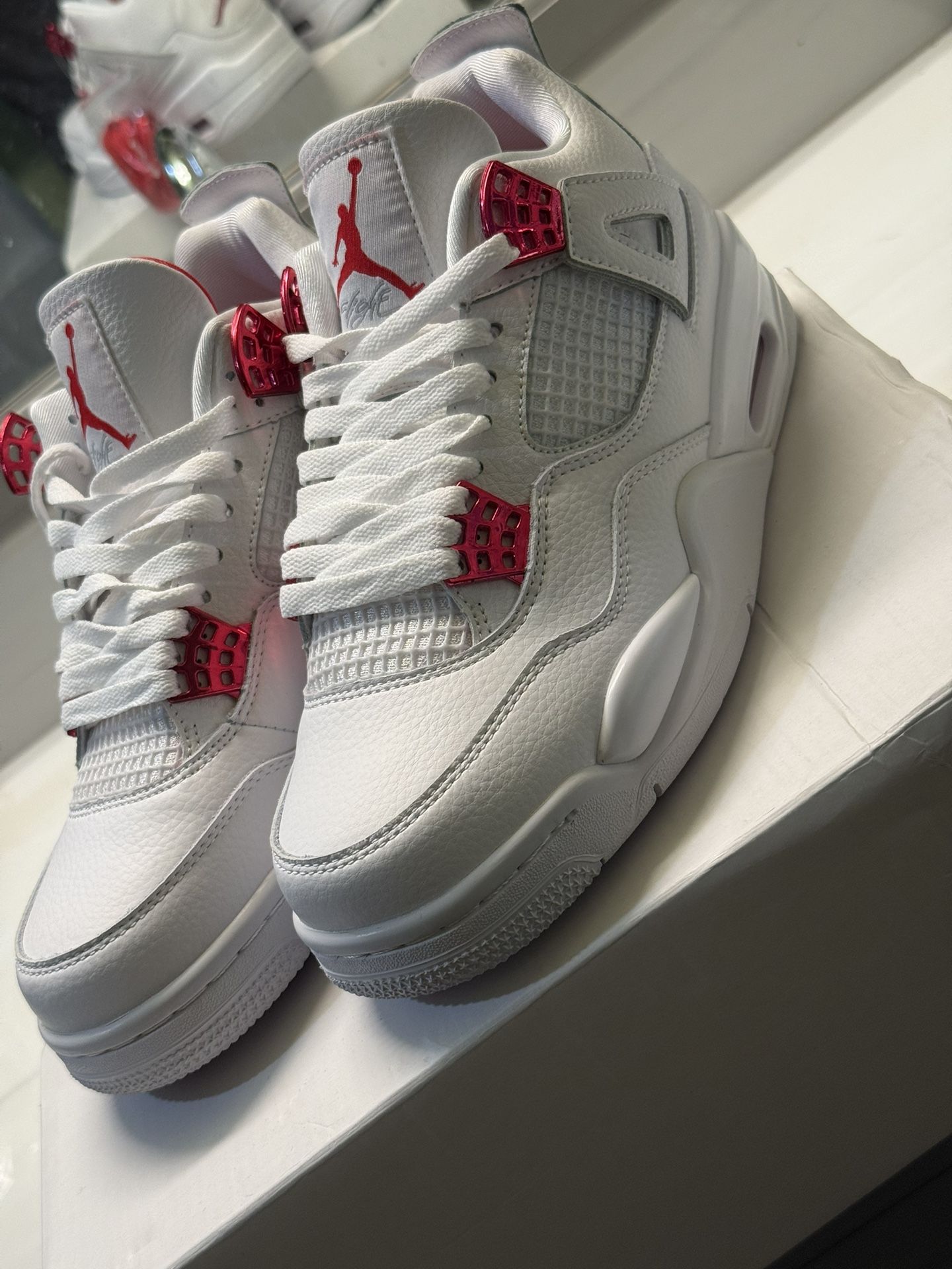 Jordan 4 Metallic Reds