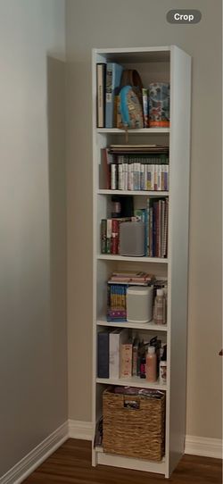 Tall white book case