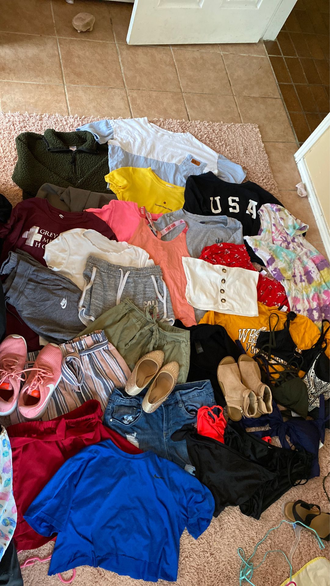 Women’s clothing, shoes(sz 7-8 ), swimsuits. Sizes vary from xs-large